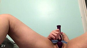 Petite blonde teases in solo masturbation play