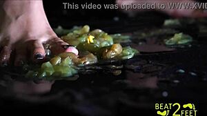 Raven Rogue's feet get drenched sticky grapes smashed wet fetish fun.
