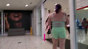 yo check this trashy milf slut flashing her pierced pussy on busy streets