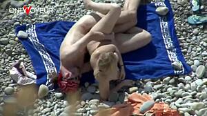 A voyeur spots juicy white girl ass fucked doggystyle on beach then creampied publicly with tan lines flashing plump tits
