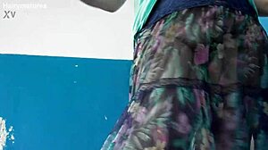 hairy mature flashing her beaver thru see-thru dress outdoors