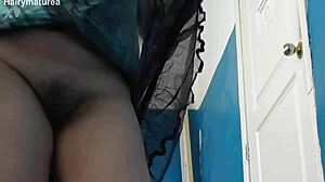 hairy mature flashing her beaver thru see-thru dress outdoors