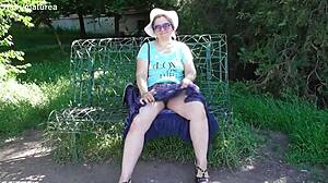 hairy mature flashing her beaver thru see-thru dress outdoors