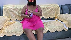 Webcam lady squeezes and shakes her huge tits playfully