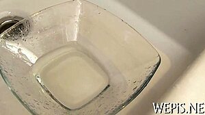 Hey, you seeing this slut pissing while getting her twat drilled sloppy with cock sucking?