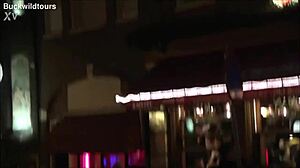 redlight district oudezijds achterburgwal draws tourists to amsterdam's vibrant dutch streets