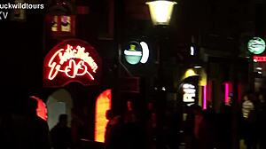 redlight district oudezijds achterburgwal draws tourists to amsterdam's vibrant dutch streets