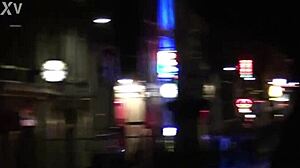 redlight district oudezijds achterburgwal draws tourists to amsterdam's vibrant dutch streets