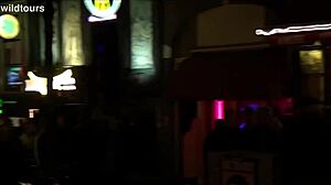 redlight district oudezijds achterburgwal draws tourists to amsterdam's vibrant dutch streets