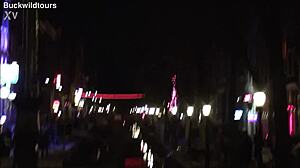 redlight district oudezijds achterburgwal draws tourists to amsterdam's vibrant dutch streets