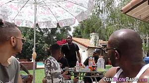 Busty babe chokes gags on multiple black cocks in interracial blowbang