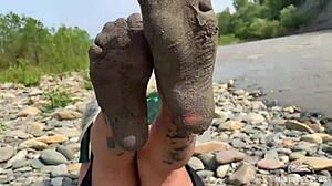 goddess's torn pantyhose reveal messy nylon feet by river closeups