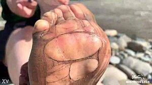 goddess's torn pantyhose reveal messy nylon feet by river closeups