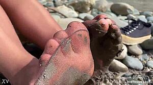 goddess's torn pantyhose reveal messy nylon feet by river closeups
