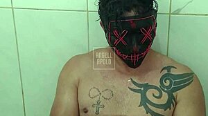 a masked tattooed guy showers solo, plays with his toy till he explodes 😏🚿💦