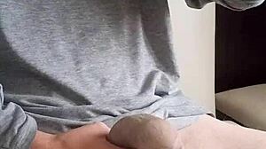 Young man cums hard on massive uncut cock