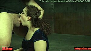 bound sub chokes on rough throatfuck from dom