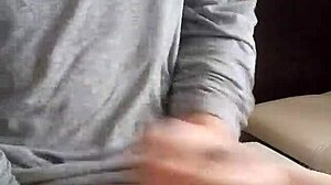 Young man cums hard on massive uncut cock