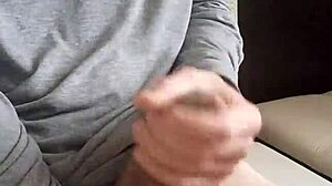 Young man cums hard on massive uncut cock