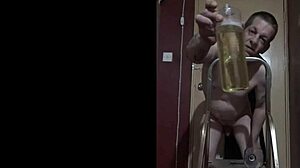 bisexual guy naked on ladder pisses in bottle drinks every drop 😂🍾