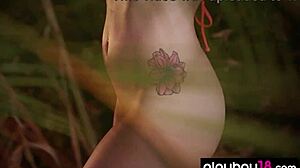 Inked Brunette Teen Elizabeth Marx Strips Huge Natural Tits in Tropical Forest