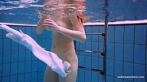 redhead marketa slips white dress off in pool for tight pussy reveal