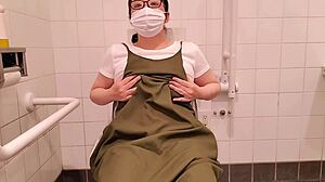 Housewife masturbates frantically inside toilet stall