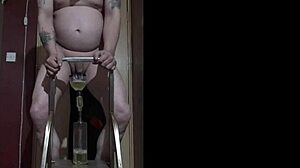 bisexual guy naked on ladder pisses in bottle drinks every drop 😂🍾