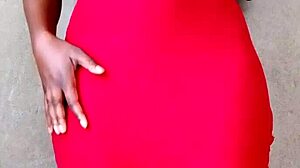 Watch this sexy African lady flash her big tits! 