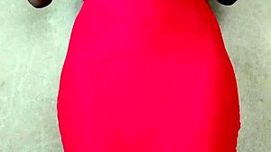 Watch this sexy African lady flash her big tits! 