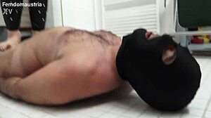 alice tramples masked slave joe on tennis balls under her feet