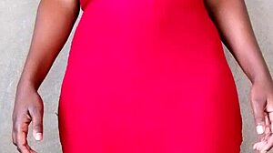 Watch this sexy African lady flash her big tits! 