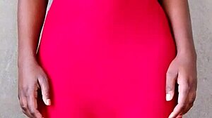 Watch this sexy African lady flash her big tits! 