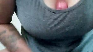 watch this tattooed brunette wife fuck her huge dildo with titties