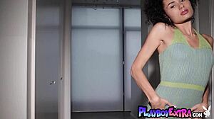 Stunning Asian teen Layla Balan strips naked revealing perky small tits and nipples