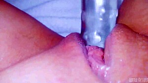 CURIOUS COED SQUIRTS HUGE ON GLASSTOY DILDO