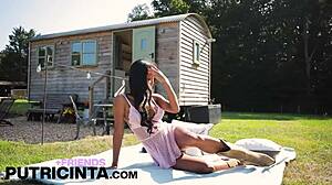 putri cinta spreads legs bares shaved asian pussy