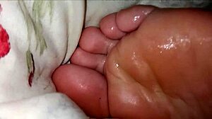 Girlfriend's toes get licked and sucked in intimate foot worship session