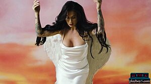 Busty tattooed milf Joanna Angel strips for Playboy tease