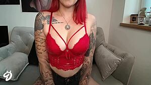 Redhead in fetish outfit shows pierced big ass nipples