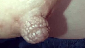 Nipple fills the frame in tight piano close-up