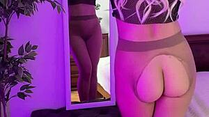 Sexy milf rips nylons to tease her curvy ass and tits