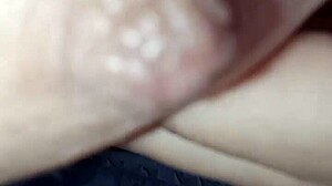 Nipple fills the frame in tight piano close-up