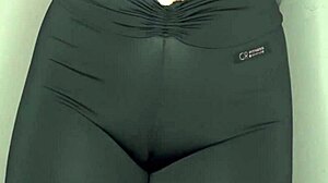 She whispers ASMR while cameltoe bulges tight black leggings