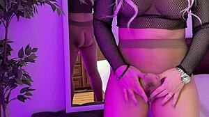 Sexy milf rips nylons to tease her curvy ass and tits