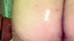 Peterwolfe Shoves Huge Pierced Dildo Deep in Shower Session