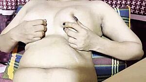 college girl fingers saggy tits pussy in dirty bathroom solo