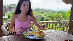 A Cute Brunette Teen Eats Burger Dripping Cum on Face at Public Cafe Cumwalk