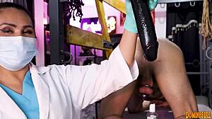 Dominafire's nurse stretches slave ass in latex rectal exam