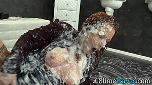 busty european glamour babe drenched in messy bukkake facial gloryhole